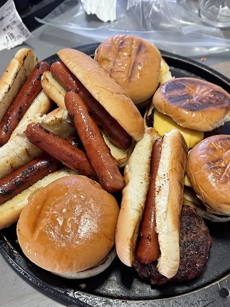 Grilled hot dogs and burgers fresh off the pan